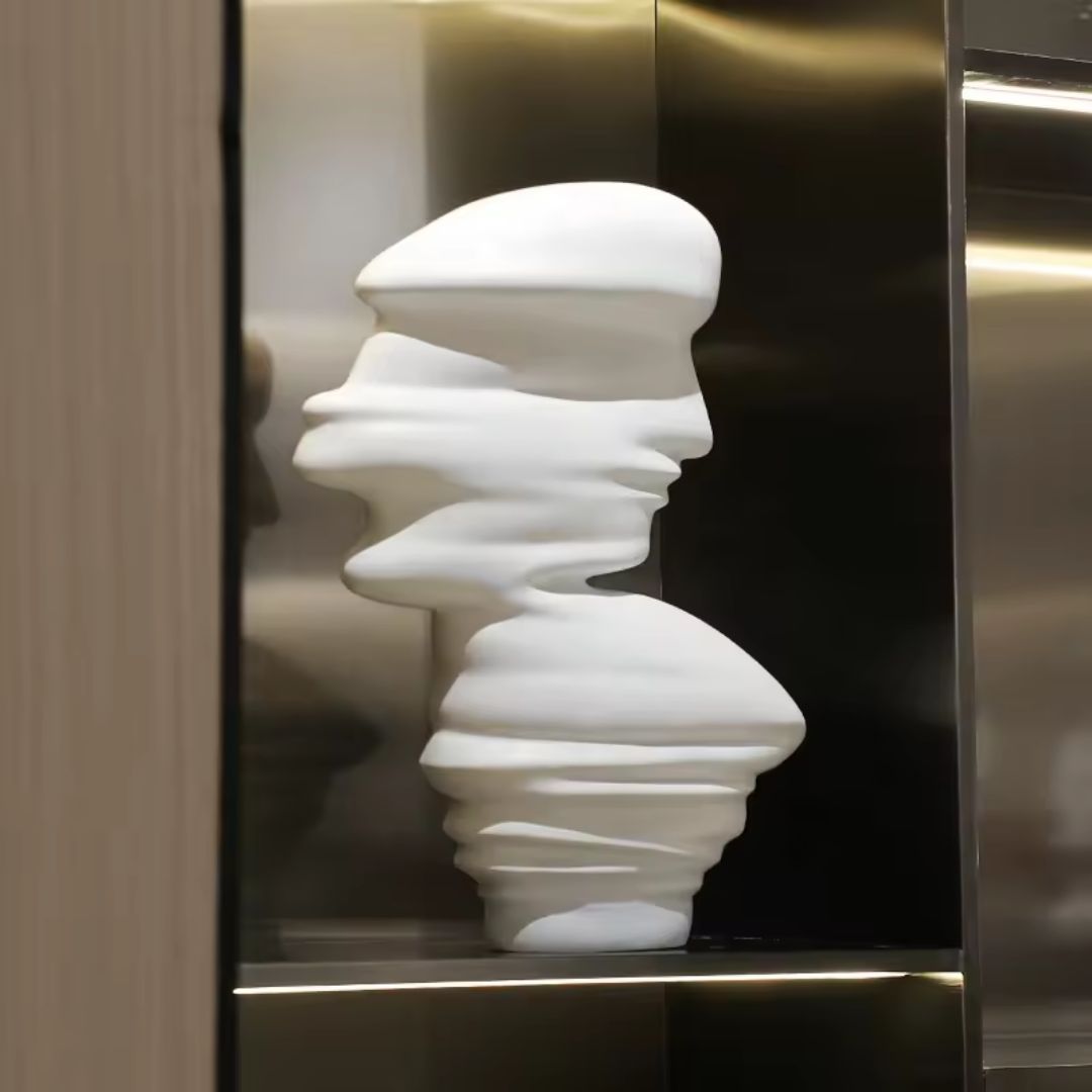 White resin abstract figurative sculpture with stone appearance, modern home decor figurine by BEACON FHDDG.