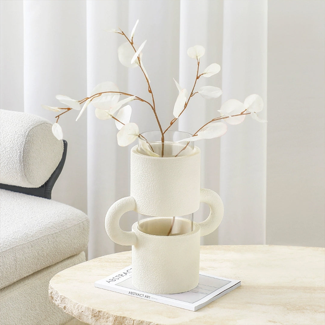 White resin and glass amphora vase by BEACON, featuring a classic shape with elegant white finish and textured surface.