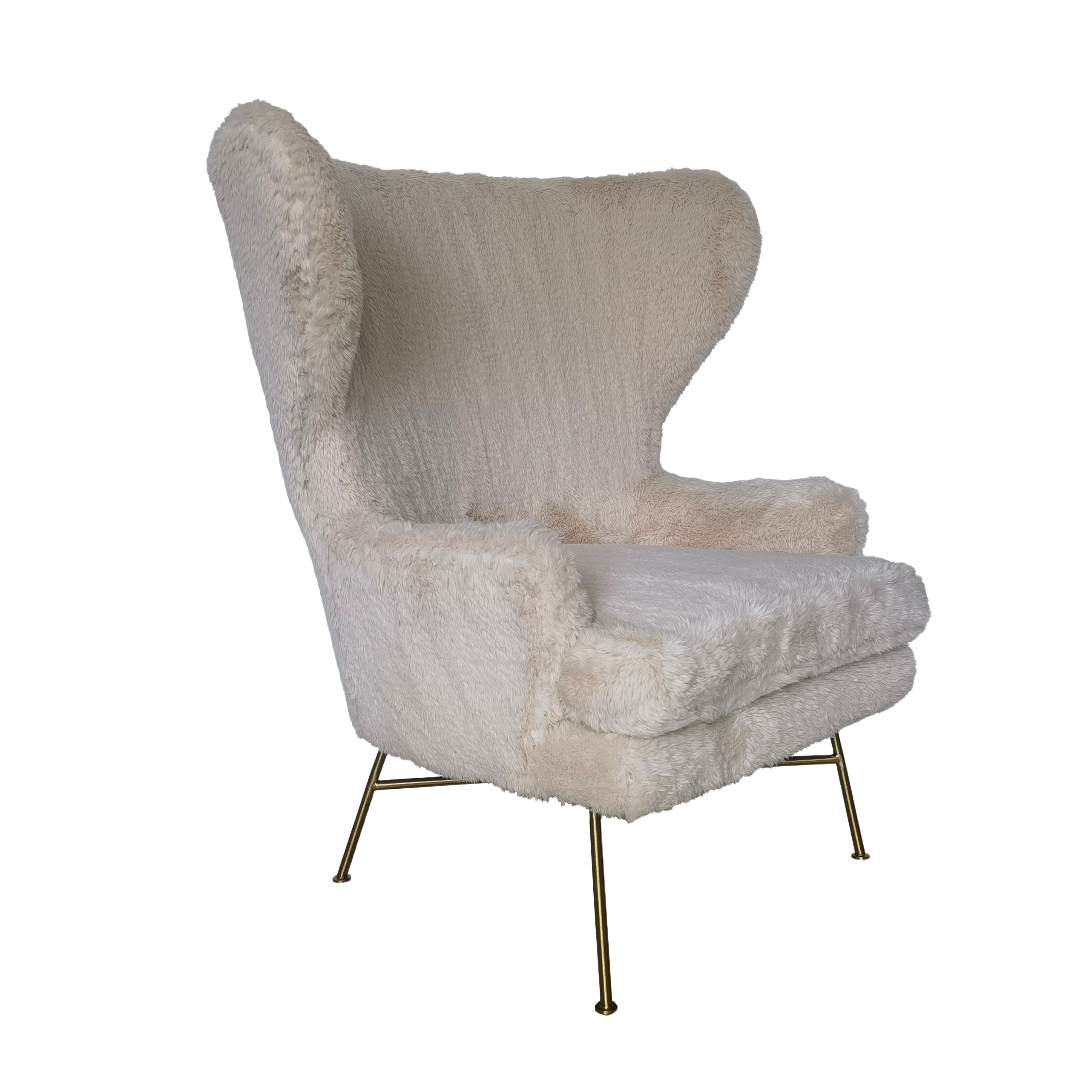 Tan SAGEBROOK HOME wing-back lounge chair with wooden legs and plush upholstery, stylish and comfortable for living spaces.