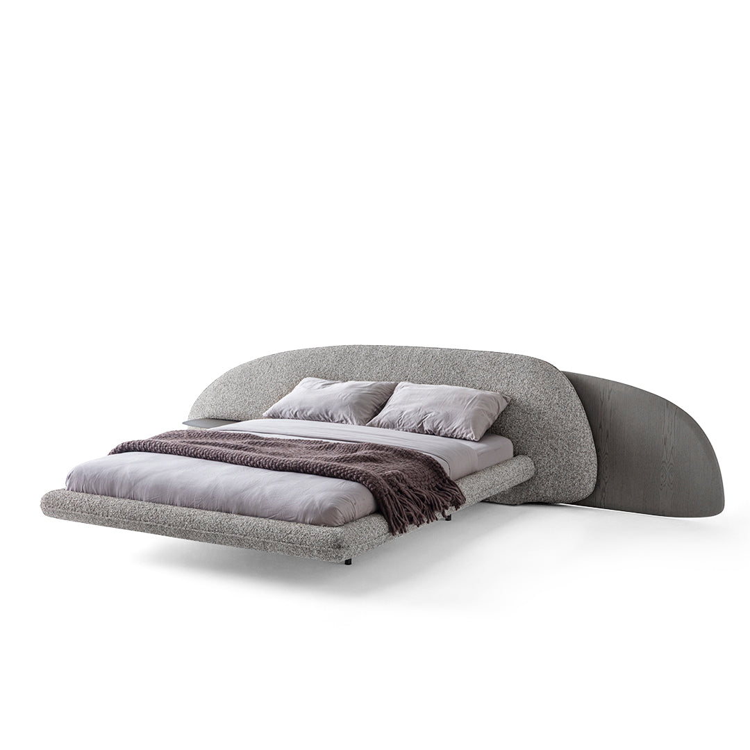 Wogg Bedstead 180 cm by HOMAGE KOLTUK, showcasing a modern bedframe with a sleek design and neutral fabric upholstery.