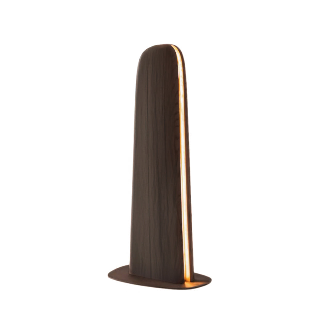 Modern Wogg Floor Lamp HM-LAMP004 by HOMAGE KOLTUK featuring a sleek, minimalist design with a tall, curved metal stand and a round lampshade.
