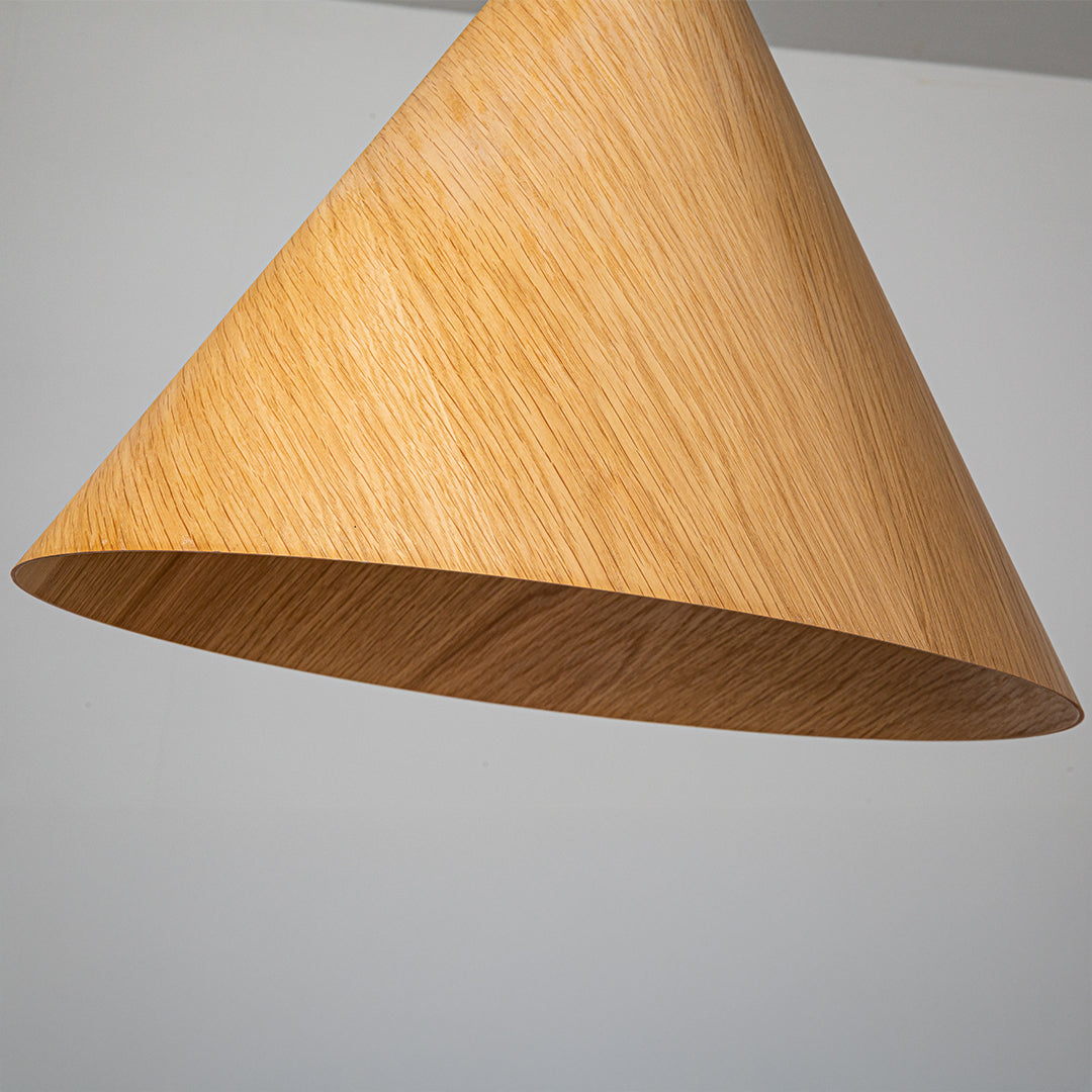 WFLDG Wood Wave Pendant Lamp in natural wood color, showcasing a modern, curved wooden design for stylish interior lighting.