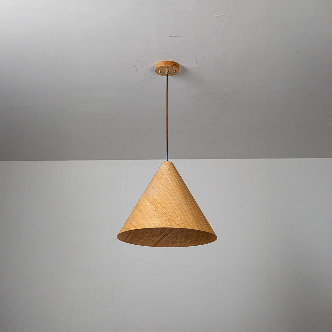Wood Wave Pendant Lamp in natural wood color by WFLDG, showcasing a sleek, curved wooden design for modern interior lighting.
