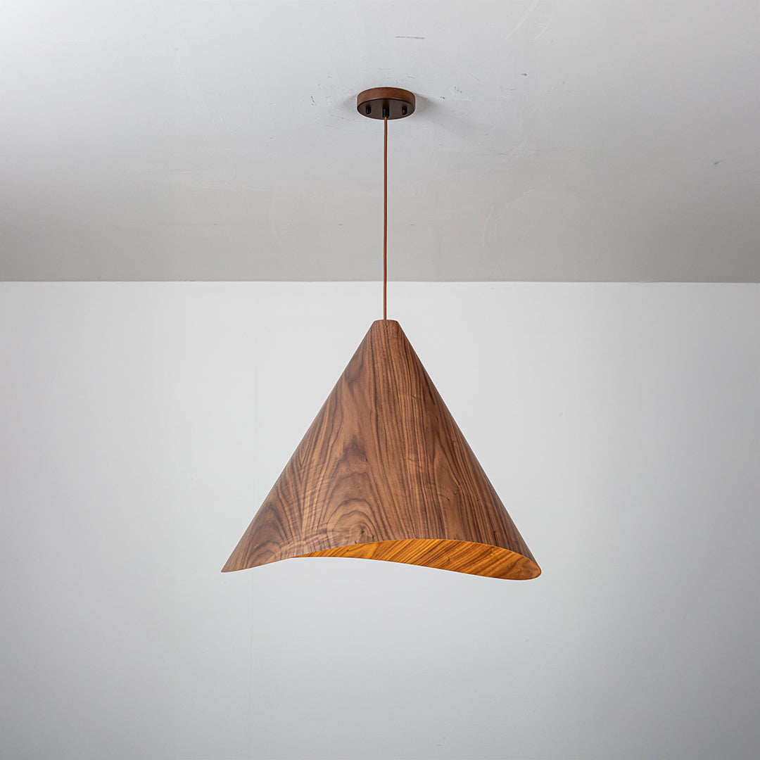 Walnut wood wave pendant lamp by WFLDG, showcasing a sculptural, natural wood finish and modern design for stylish lighting.