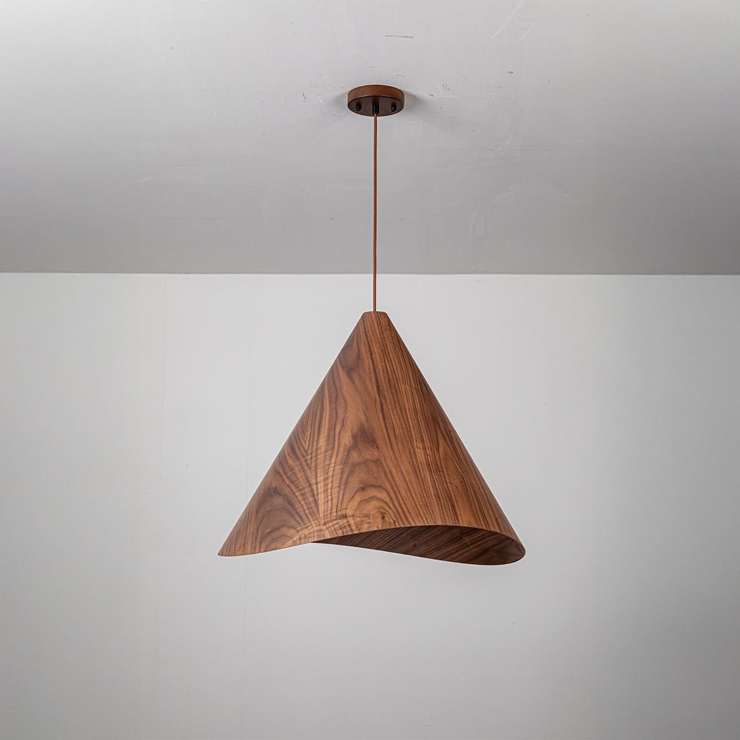 Walnut wood wave pendant lamp from WFLDG featuring a sleek, modern design in natural walnut wood color.