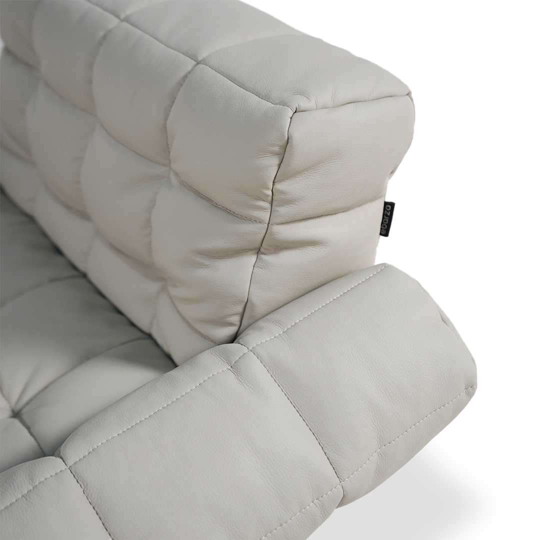 White Yabo Lounge Chair LC077WHT by BEACON featuring a modern design with a cushioned seat and sleek wooden legs.