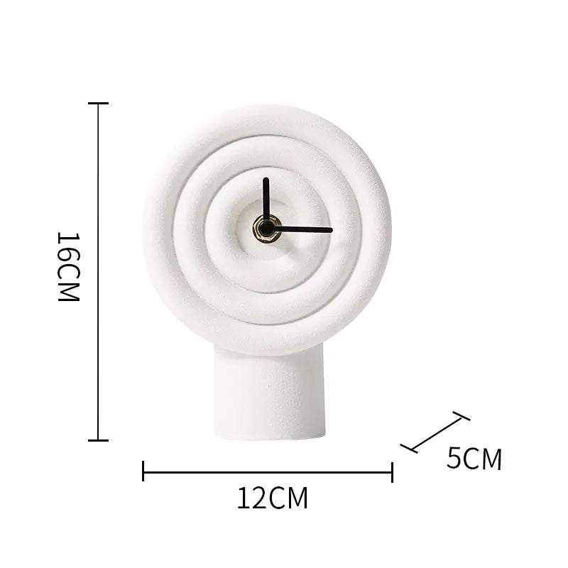 Gray resin table clock by BEACON, model FC-SZ2177C, featuring a sleek, modern design for home or office decor.